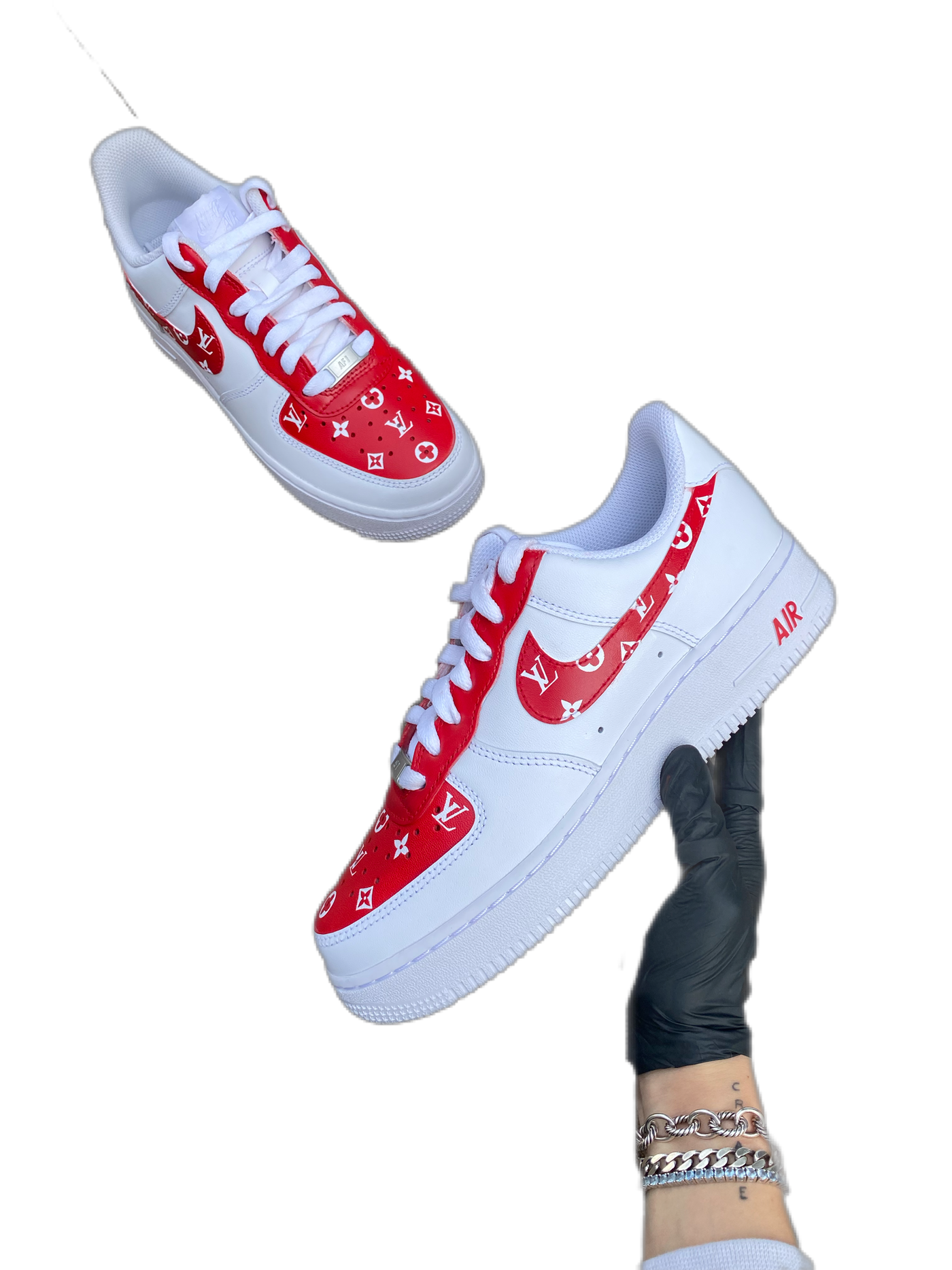 Custom sneakers with a red and white designer monogram design