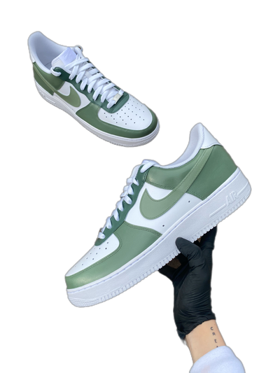 Custom sneakers with 3 complimenting shades of green painted throughout the sneaker