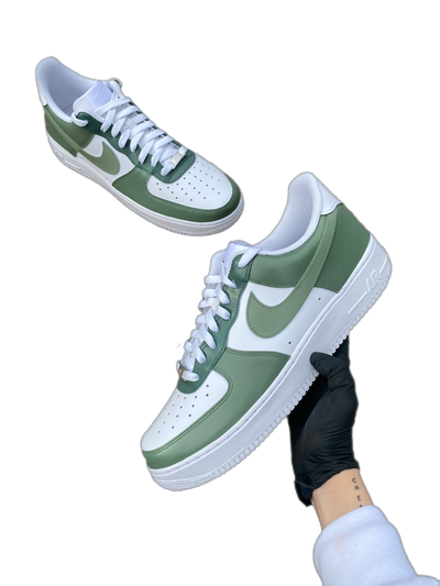 Custom sneakers with 3 complimenting shades of green painted throughout the sneaker