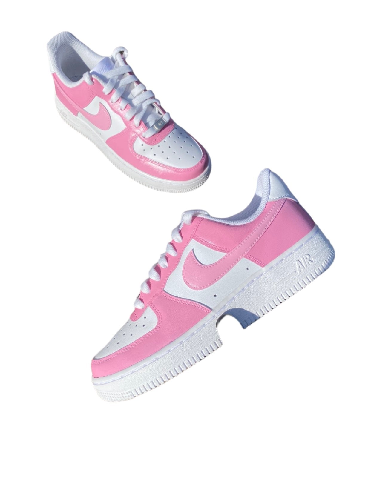 Custom pink and white Nike Air Force 1 sneakers