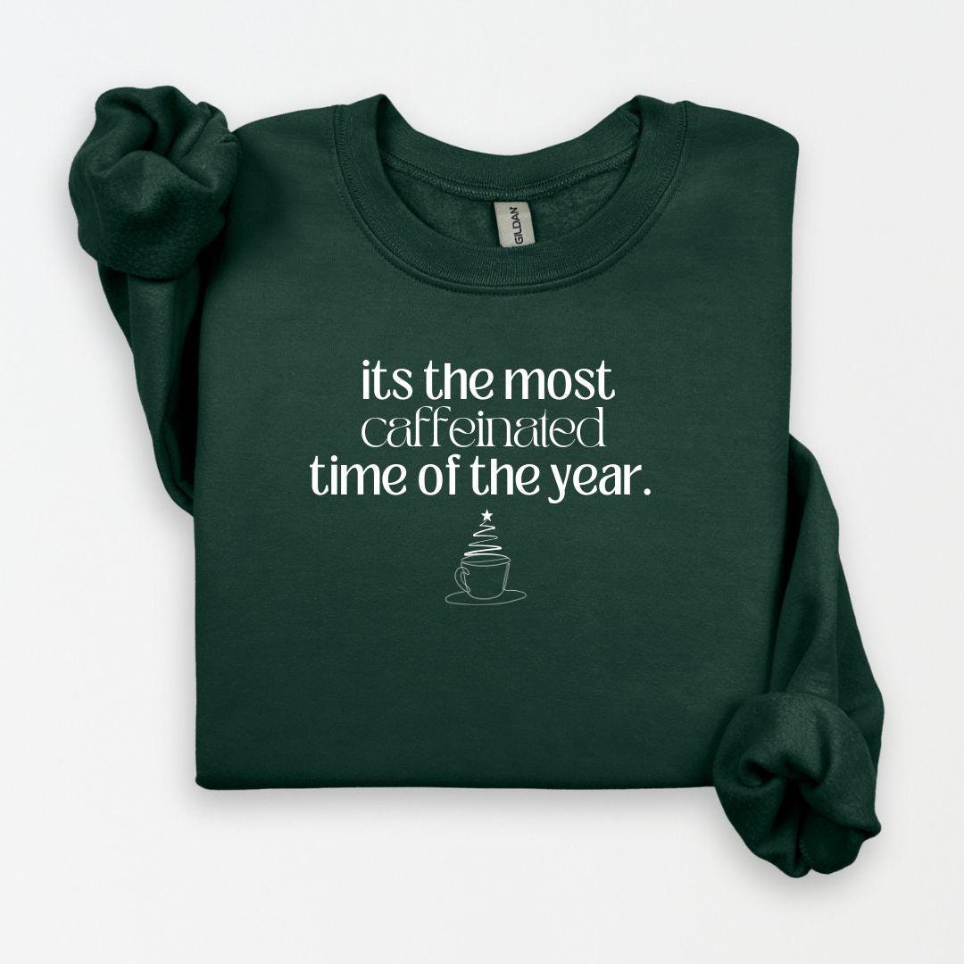 Custom forest green sweatshirt with a funny holiday coffee-themed graphic and saying