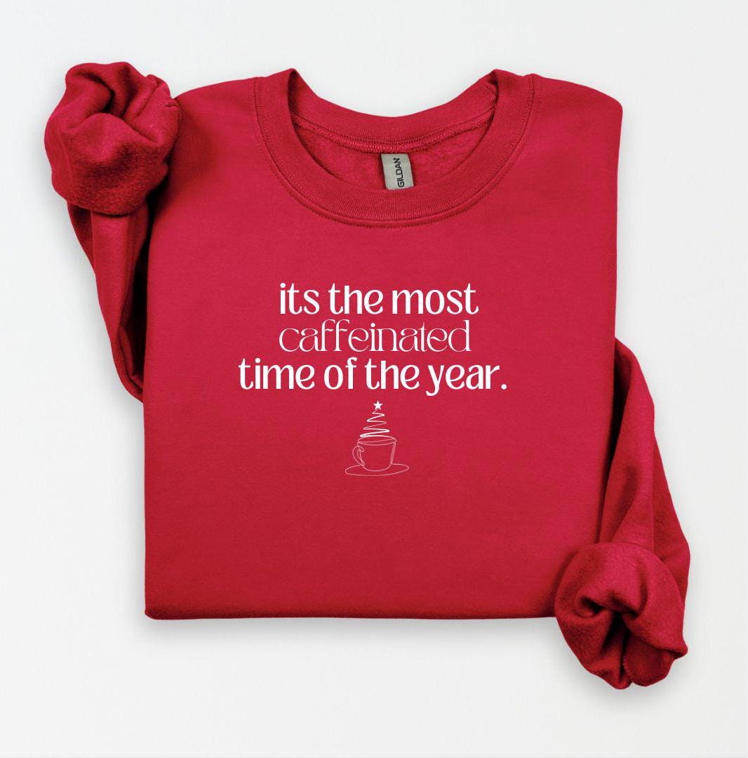 Custom red sweatshirt with a funny holiday coffee-themed graphic and saying