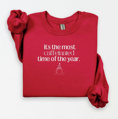 Custom red sweatshirt with a funny holiday coffee-themed graphic and saying