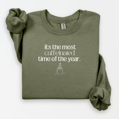 Custom moss green sweatshirt with a funny holiday coffee-themed graphic and saying